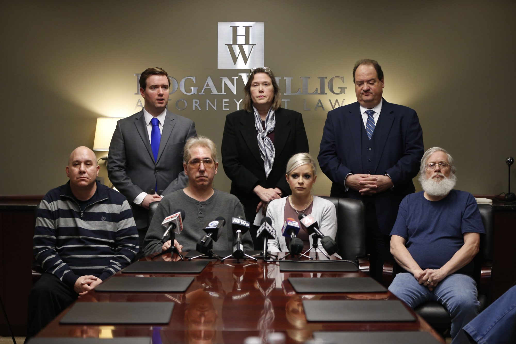Michael Eames was part of a news conference with other survivors – and their lawyers – last year when the Child Victims Act became law. Standing from left, attorneys William Lorenz Jr., Diane Tiveron and Steven Cohen of HoganWillig; seated from left, Kevin Haslam, Antonio "Tino" Flores, Vanessa DeRosa and Eames. (Derek Gee/Buffalo News)