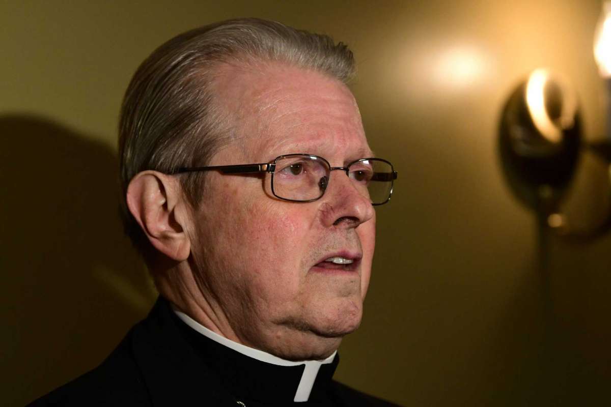 Bishop Edward Scharfenberger is interviewed by the press ahead of a prayer service for sex abuse survivors at the Cathedral of the Immaculate Conception in Albany, N.Y. on Wednesday, Dec. 18, 2019. (Lori Van Buren/Times Union)Lori Van Buren/Albany Times Union