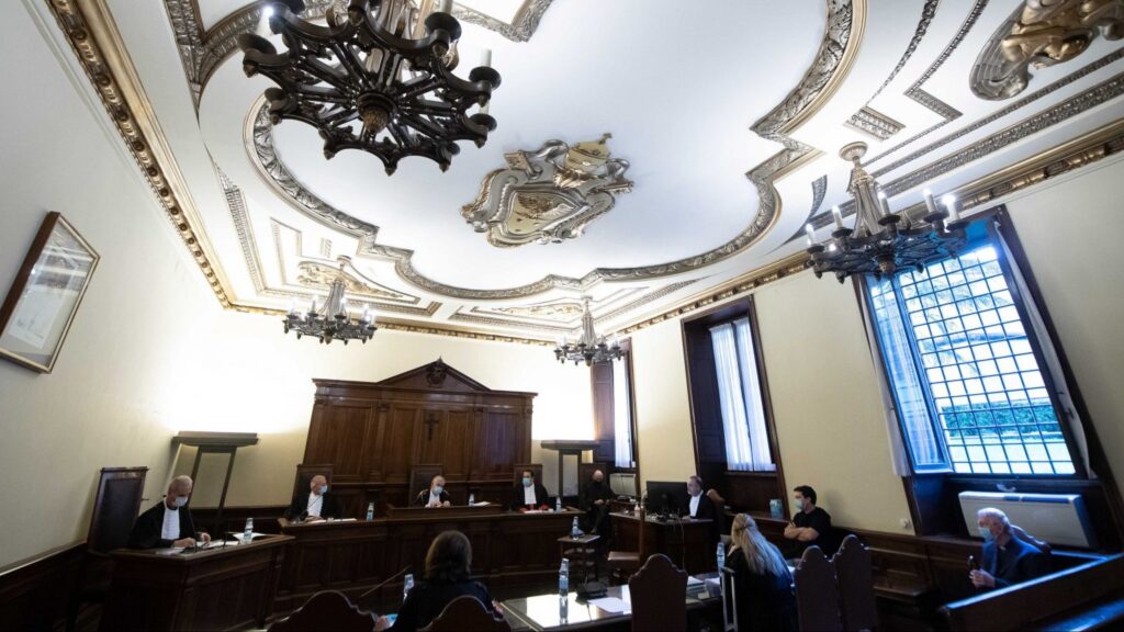 This Oct. 14, 2020, file photo shows the Vatican City State criminal court during the opening of the trial of Father Gabriele Martinelli and Msgr. Enrico Radice. At a Vatican trial Feb. 24, former students of the St. Pius X Pre-Seminary told the court that there was an "unhealthy" environment at the seminary and that they endured psychological pressure and witnessed inappropriate touching by Father Martinelli, who is accused of abusing a younger student. (CNS photo/Vatican Media)