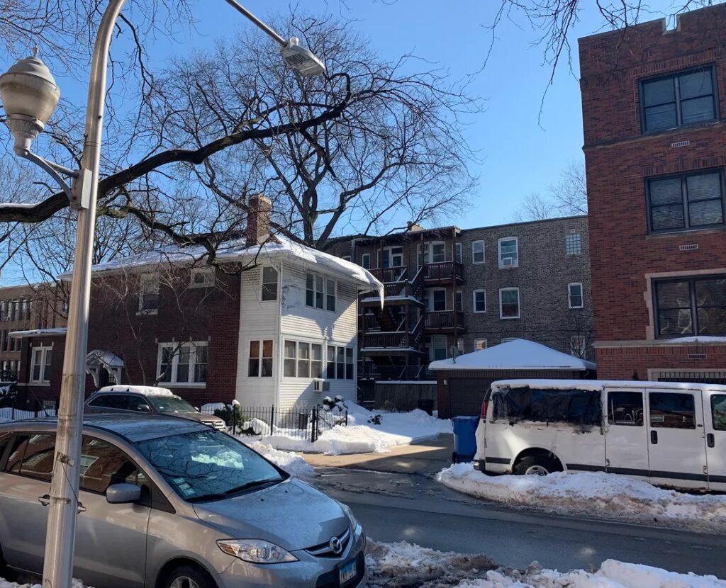 This photo shows how close a Catholic elementary school in Hyde Park is to an Augustinian monastery that housed two priests facing allegations of child sex abuse. At the far right of photo is the edge of the friary. On the far left is the edge of the school. Robert Herguth / Sun-Times