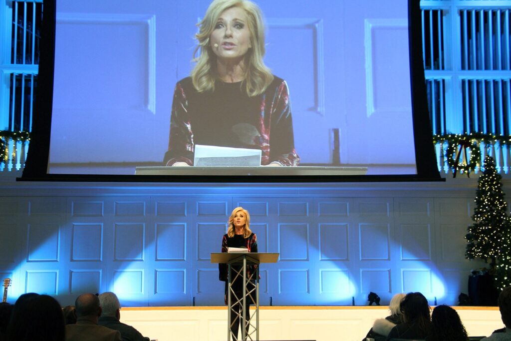 Beth Moore speaking at a summit on sexual abuse and misconduct at Wheaton College in Wheaton, Ill., in 2018. She has described the election of 2016 as a turning point for her in her decision to leave the Southern Baptist Convention.Credit...Emily McFarlan Miller/Religion News Service