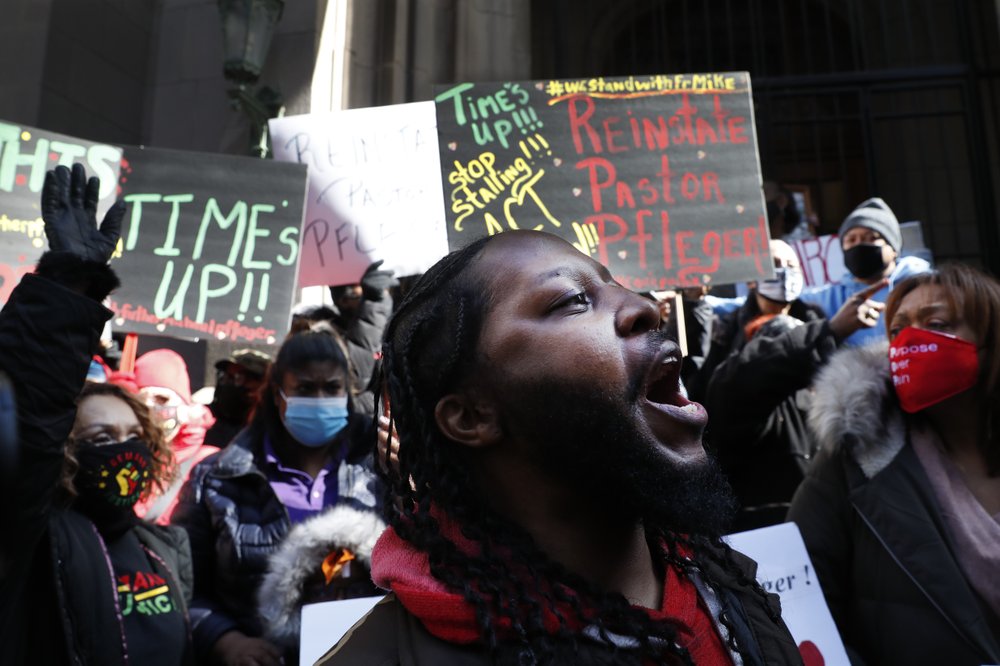 Joseph Saunders and other members of Chicago's St. Sabina Catholic Church rally outside the Archdiocesan Pastoral Center in Chicago demanding resolution of the investigation into allegations against the Rev. Michael Pfleger on Wednesday, Feb 24, 2021 in Chicago.