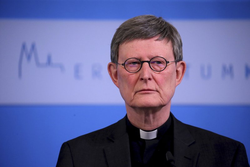 Cardinal Rainer Maria Woelki, Archbishop of Cologne, attends a press conference of the Archdiocese of Cologne to present the consequences of last week published abuse report in Cologne, Germany, Tuesday, March 23, 2021. (Oliver Berg / dpa via AP)