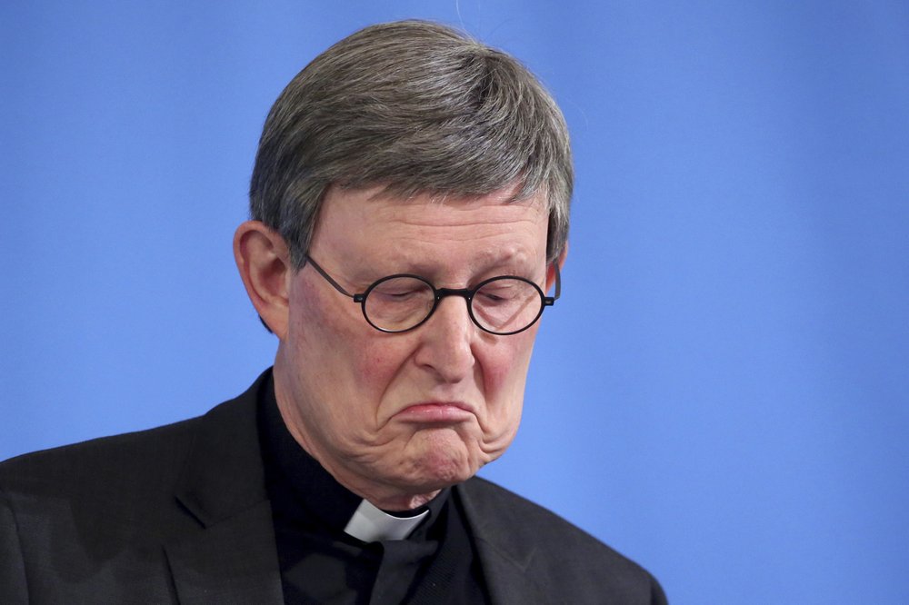 Cardinal Rainer Maria Woelki, Archbishop of Cologne, attends a press conference of the Archdiocese of Cologne to present the consequences of last week published abuse report in Cologne, Germany, Tuesday, March 23, 2021. (Oliver Berg / dpa via AP)