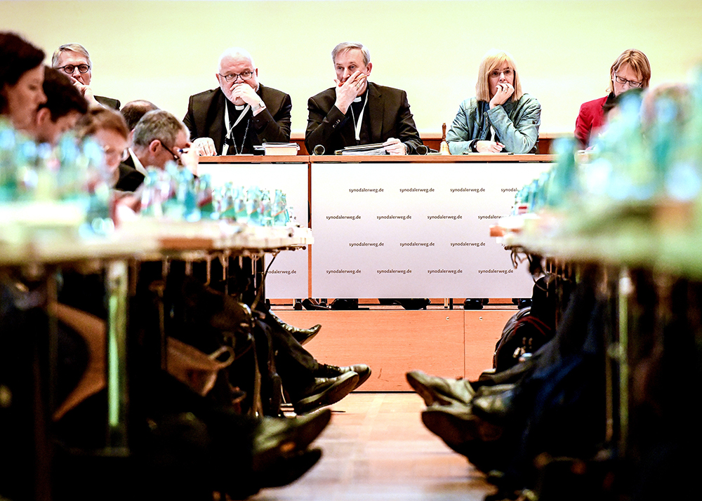 Lay leaders and bishops are seen Jan. 31, 2020, during the synodal assembly in Frankfurt, Germany. Pictured at the front table, from left, are Thomas Sternberg, president of the Central Committee of German Catholics; Cardinal Reinhard Marx of Munich and Freising, president of the German bishops’ conference; Auxiliary Bishop Wilfried Theising of Munster; Claudia Nothelle, member of the central committee; and Karin Kortmann, vice president of the central committee. (Photo: CNS / Harald Oppitz, KNA)