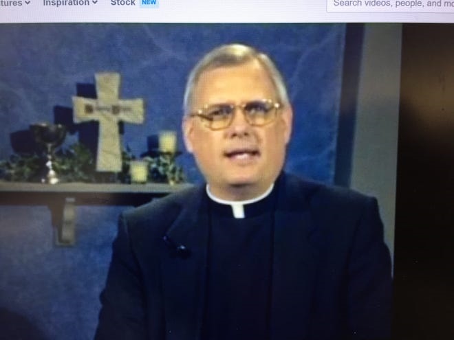 Msgr Robie Robichaux appears in an online video where he speaks about forgiveness. - Daily Advertiser
