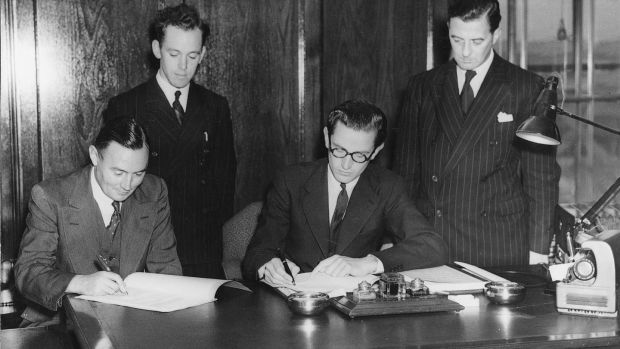Minister for health Dr Noel Browne and John G Sisk sign the contract for the Galway TB Sanatorium, Merlin Park, with William Cotter, (standing left) and architect Norman JS White (standing right).