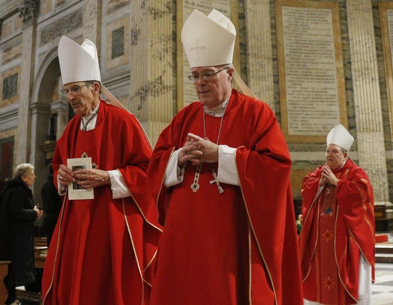 Bishop John LeVoir of New Ulm, Minnesota, Bishop Michael Hoeppner of Crookston, Minnesota, and Archbishop Bernard Hebda of St. Paul-Minneapolis, leave in procession after celebrating Mass with U.S. bishops at the Basilica of St. Paul Outside the Walls in Rome Jan. 15, 2020. (CNS/Paul Haring)