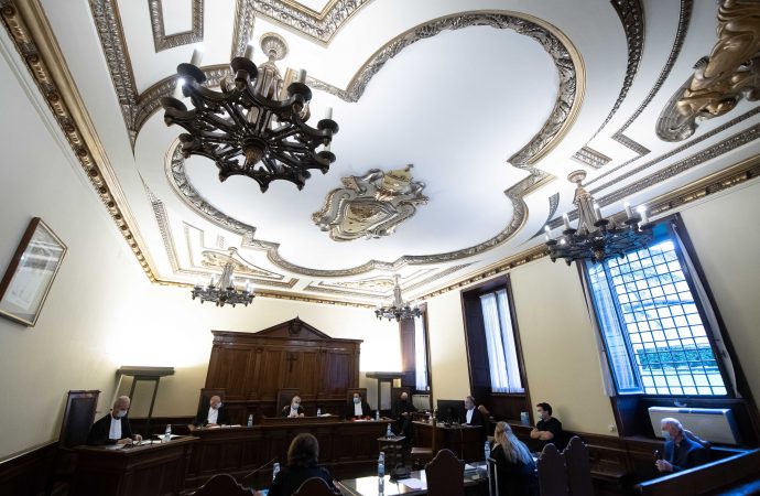 This Oct. 14, 2020, file photo shows the Vatican City State criminal court during the opening of the trial of Father Gabriele Martinelli and Msgr. Enrico Radice. At a Vatican trial Feb. 24, former students of the St. Pius X Pre-Seminary told the court that there was an "unhealthy" environment at the seminary and that they endured psychological pressure and witnessed inappropriate touching by Martinelli, who is accused of abusing a younger student. (Credit: CNS photo/Vatican Media.)