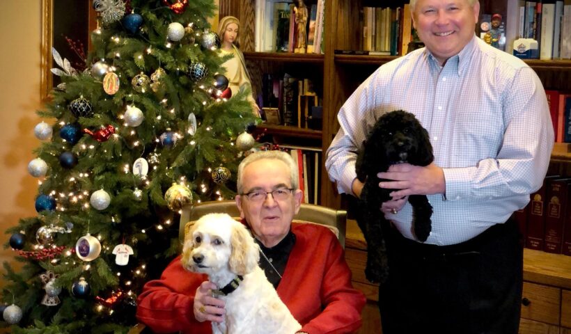Stika poses with Cardinal Justin Rigali on the cover of his 2017 Christmas card. Rigali, who worked with Stika in the Archdiocese of St. Louis, resides in Stika’s Knoxville home.
