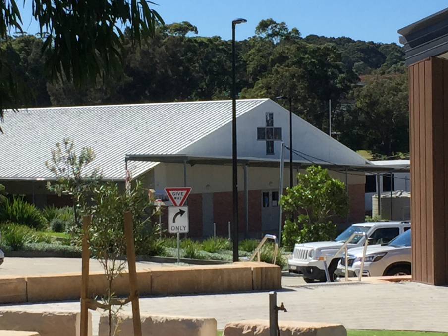 Roger Kennedy Centre: The building in question as seen from the Pacific Highway at Gateshead. The church and school are refusing to say publicly why Monsignor Kennedy's name has been removed. Picture: Ian Kirkwood