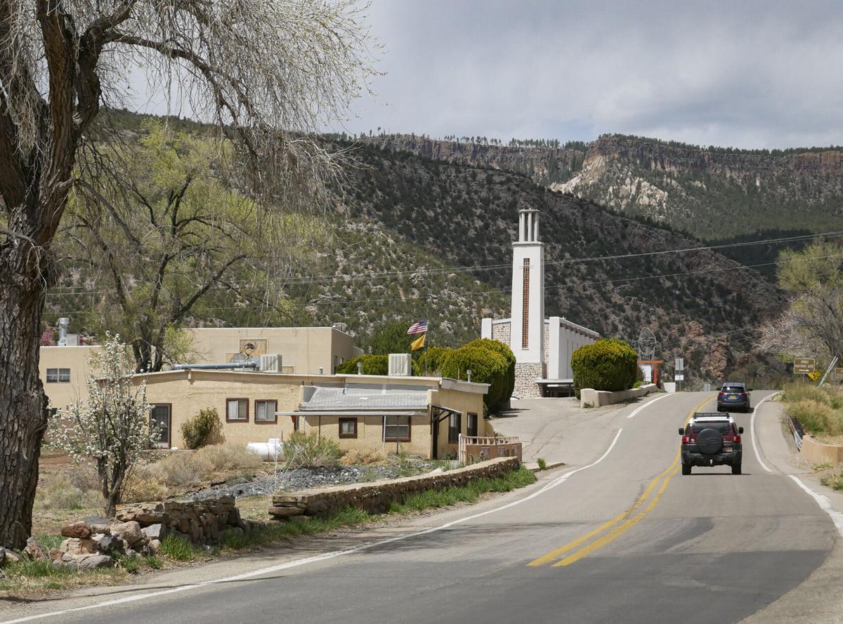 The tower of Mary, Mother of Priests Catholic Church rises along N.M. 4 in Jemez Springs. Matt Dahlseid / The New Mexican