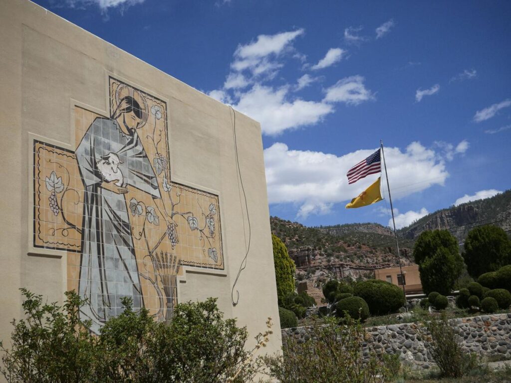 A mural on a wall of the complex around Mary, Mother of Priests Catholic Church in Jemez Springs. Matt Dahlseid / The New Mexican