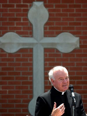 Father Ed Bradley speaks at a dedication ceremony for the then-new Father J. Edward Bradley Parish Center at the Holy Name of Jesus Catholic Church. (Gleaner photo by Mike Lawrence • 831-8346 or mlawrence@thegleaner.com)