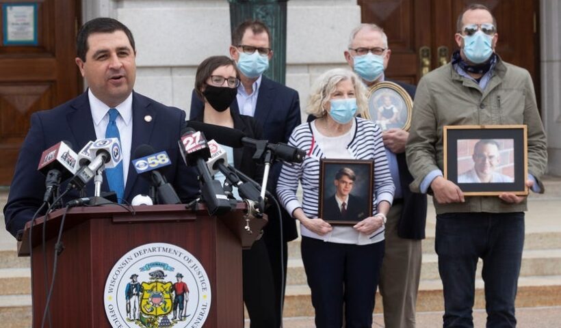 Attorney General Josh Kaul speaks Tuesday, April 27, 2021 at the state Capitol about a Wisconsin Department of Justice initiative to review clergy abuse cases. In the background is the family of Nate Lindstrom, who took his own life at age 45 last year. Lindstrom accused three priests at St. Norbert Abbey in De Pere of sexual abuse. MARK HOFFMAN / MILWAUKEE JOURNAL SENTINEL