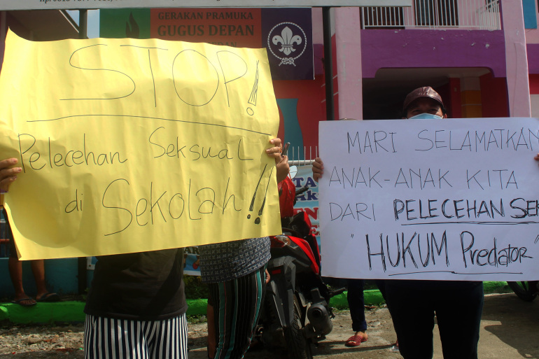 Parents protested outside the school earlier this month calling for a full investigation into the allegations of abuse [Tonggo Simangunsong/Al Jazeera]