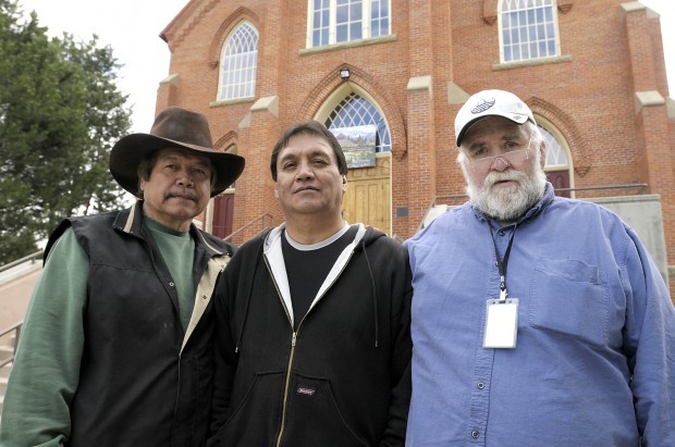 Leland Hewankorn, Francis Burke and Garry Salois stand outside St Ignatius Mission. They’re among some 500 people who recently reached a settlement with the Oregon Province of the Society of Jesus for reported abuse, but they say what they really want is an apology. Photo by Tom Bauer / Missoulian