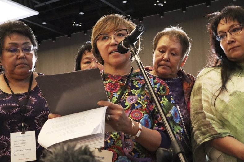 After going public with her story of abuse, Elsie Boudreau (center) became an advocate for other survivors in Alaska Native communities through her nonprofit Arctic Winds Healing Winds. (Credit: Emily Schwing / Reveal via AP.)