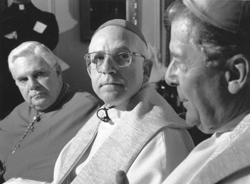 In this May 31, 1990 file photo from right, the Most Rev. Joseph F. Maguire, bishop of the Roman Catholic Diocese of Springfield, is shown with the Most Rev. Thomas L. Dupre, who was ordained that day as auxiliary bishop, and Cardinal Bernard Law. A 2009 civil suit against Maguire and Dupre alleged they knowingly allowed a priest with a history of child molestation to remain in the ministry. Law resigned in 2002 amid allegations of covering up sexual abuse in the archdiocese. Two years later, Dupre was indicted on child rape charges and removed from the ministry.