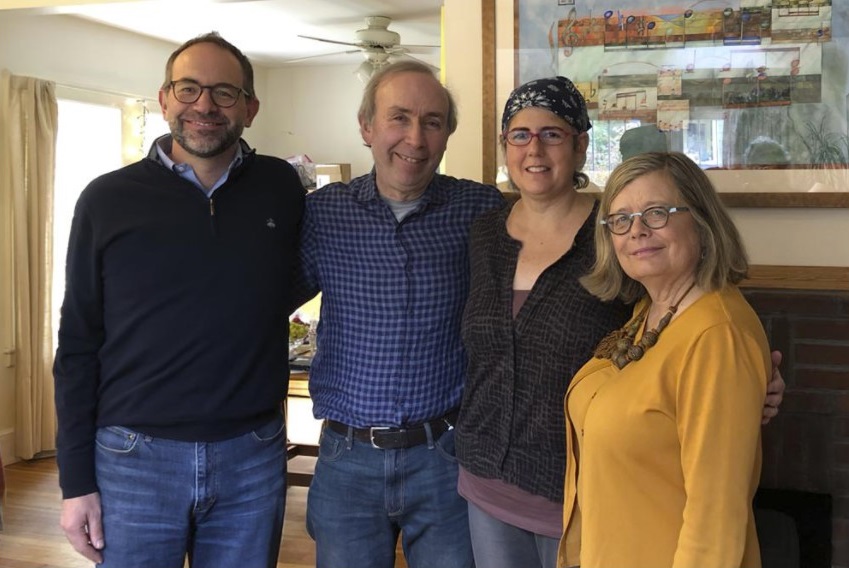 Associated Press Religion Writer Rachel Zoll, second from right, receives a visit in Amherst, Mass., on Oct. 26, 2018, from Managing Editor Brian J. Carovillano, editor at large Jerry Schwartz, and Deputy Managing Editor Sarah L. Nordgren after being awarded an Oliver S. Gramling Journalism Award for being AP's pre-eminent voice on religion for more than a decade. Zoll, who for 17 years as a religion writer for The Associated Press endeared herself to colleagues, competitors, and sources with her warm heart and world-class reporting skills, has died after a three-year bout with brain cancer. She was 55. (Cheryl Zoll via AP)