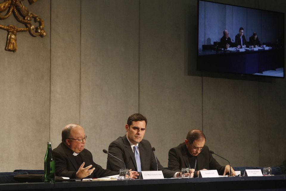 Archbishop Charles Scicluna of Malta and Bishop Juan Ignacio Arrieta, secretary of the Pontifical Council for Legislative Texts, together with Alessandro Gisotti of the Vatican press office, present Pope Francis' document on abuse norms, "Vos Estis Lux Mundi" ("You Are the Light of the World") at the Vatican May 9, 2019. (CNS/Robert Duncan)