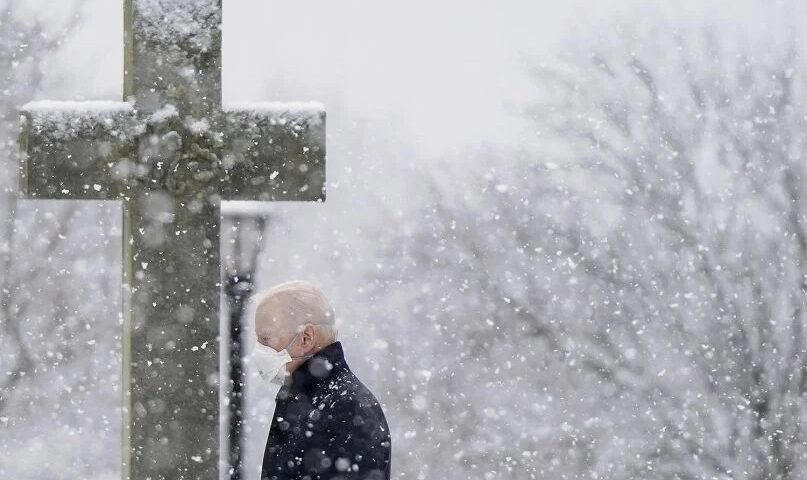 President Joe Biden departs after attending Mass at St. Joseph on the Brandywine Catholic Church as snow falls, Feb. 7, 2021, in Wilmington, Delaware. (AP Photo/Patrick Semansky)