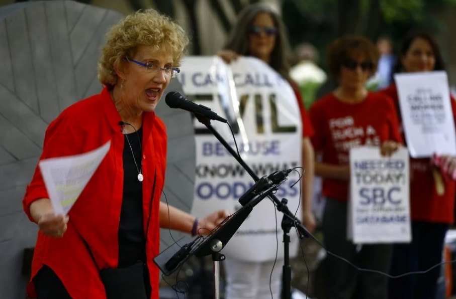 Christa Brown speaks against clergy abuse during a rally outside the annual meeting of the Southern Baptist Convention at the Birmingham-Jefferson Convention Complex on June 11, 2019, in Birmingham, Alabama. RNS photo by Butch Dil