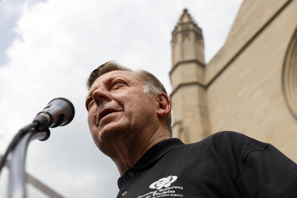 Father Michael Pfleger speaks for first time during a press conference after his reinstatement as the senior pastor at St. Sabina Church by Archdiocese of Chicago, Monday, May 24, 2021 at St. Sabina Catholic Church in the Auburn Gresham neighborhood in Chicago. (AP Photo/Shafkat Anowar)  Parishioners of St. Sabina Catholic Church cheers as Father Michael Pfleger speaks for first time during a press conference after his reinstatement as the senior pastor at St. Sabina Church by Archdiocese of Chicago, Monday, May 24, 2021, at St. Sabina Catholic Church in the Auburn Gresham neighborhood in Chicago. (AP Photo/Shafkat Anowar)  Parishioners of St. Sabina Catholic Church cheers as Father Michael Pfleger speaks for first time during a press conference after his reinstatement as the senior pastor at St. Sabina Church by Archdiocese of Chicago, Monday, May 24, 2021, at St. Sabina Catholic Church in the Auburn Gresham neighborhood in Chicago. (AP Photo/Shafkat Anowar)  Father Michael Pfleger stands among supporters before a news conference outside St. Sabina Church, after the Archdiocese of Chicago announced that Pfleger will return to his role at senior pastor at at the Auburn Gresham church, Monday afternoon, May 24, 2021. The archdiocese cleared him to return after an internal probe into decades-old allegations of sexual abuse against minors. (Ashlee Rezin Garcia/Chicago Sun-Times via AP)  Father Michael Pfleger embraces Jordan-Amman Isiah West-Williams, 9, who was baptized by Father Pfleger, following his reinstatement by Archdiocese of Chicago, Monday, May 24, 2021, in front of St. Sabina Catholic Church in the Auburn Gresham neighborhood in Chicago. (AP Photo/Shafkat Anowar)