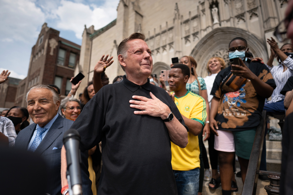 Credit: Colin Boyle/Block Club Chicago Father Michael Pfleger is greeted by supporters at St. Sabina Church on May 24, 2021. Earlier in the day, the Archdiocese reinstated the popular pastor after a five-month-long investigation into sexual abuse allegations.