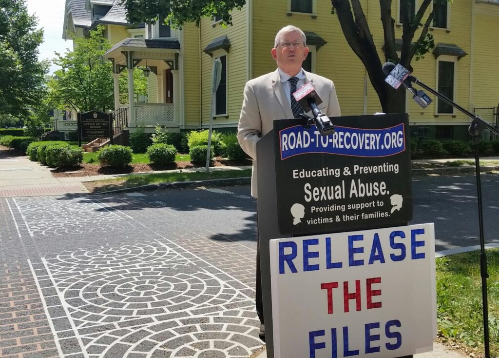 Robert Hoatson of Road to Recovery addressed reporters across the street from the chancery of the Springfield Diocese the day after the Hampden District Attorney said a recently deceased defrocked priest was the murderer of a 13-year-old altar boy in 1972. CREDIT PAUL TUTHILL / WAMC