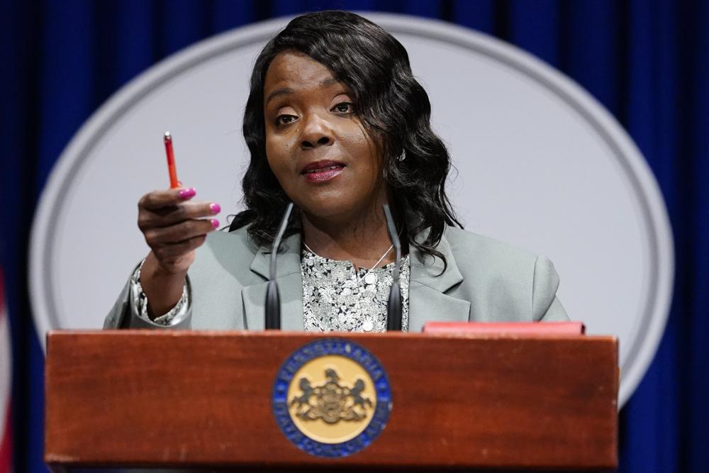 Acting Secretary of State Veronica Degraffenreid speaks with members of the media during a news conference at the Pennsylvania Capitol in Harrisburg, Pa., Wednesday, May 26, 2021. Degraffenreid discussed the results of an internal investigation into a bureaucratic blunder that scuttled a statewide voter referendum on whether to give victims of childhood sexual abuse a fresh opportunity to sue their abusers and complicit institutions. (AP Photo/Matt Rourke)