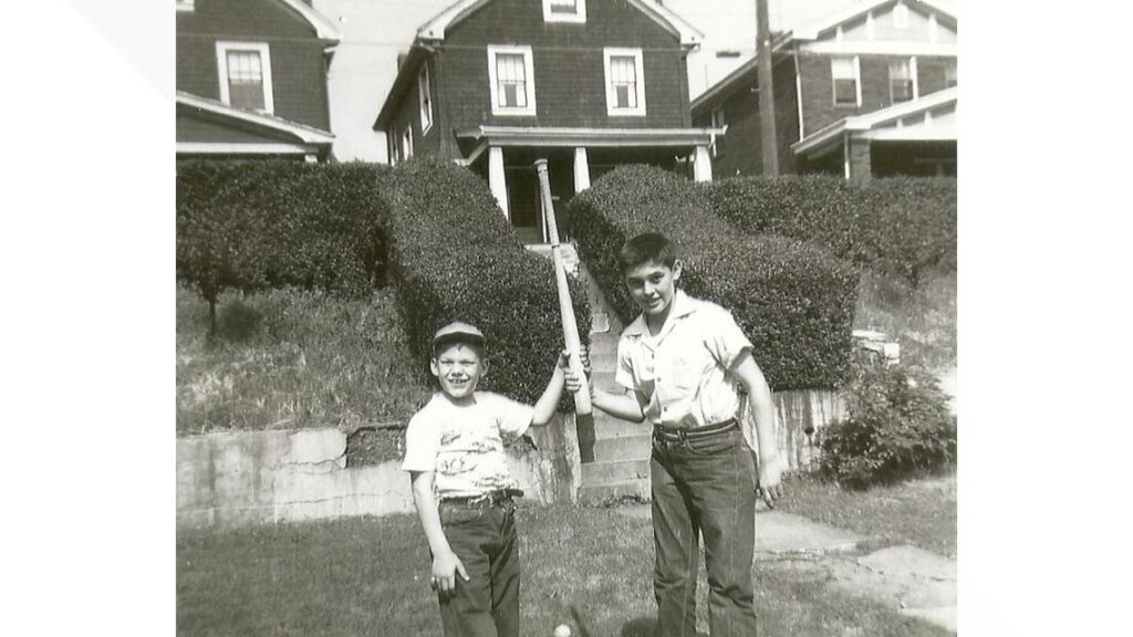 Courtesy Harriet Dudich Bobby Bizup and his cousin, Dan Pyzola, mess around with a baseball bat.