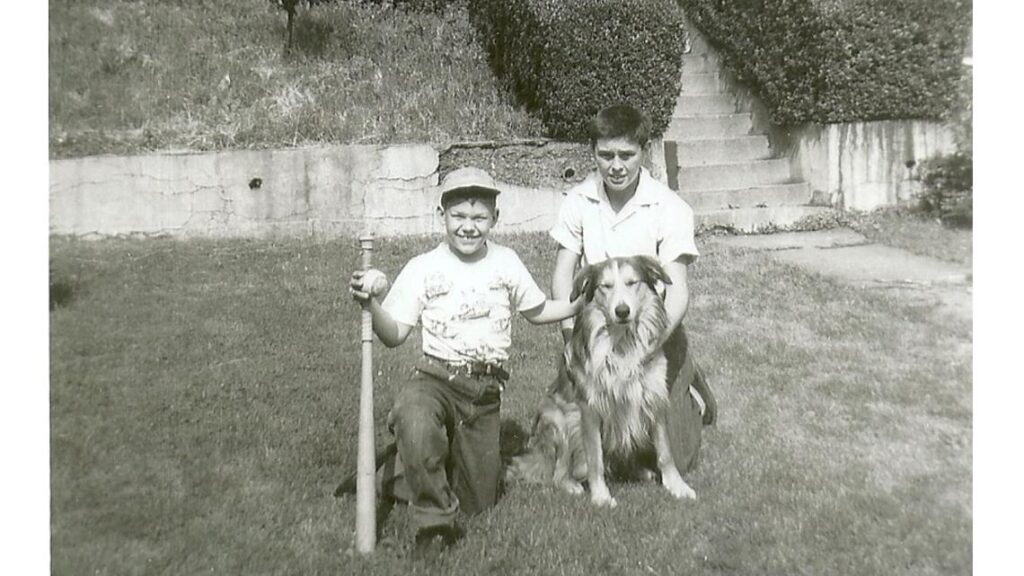 Courtesy Harriet Dudich Bobby Bizup and his cousin, Dan Pyzola, pose with Dan's dog, Duke.