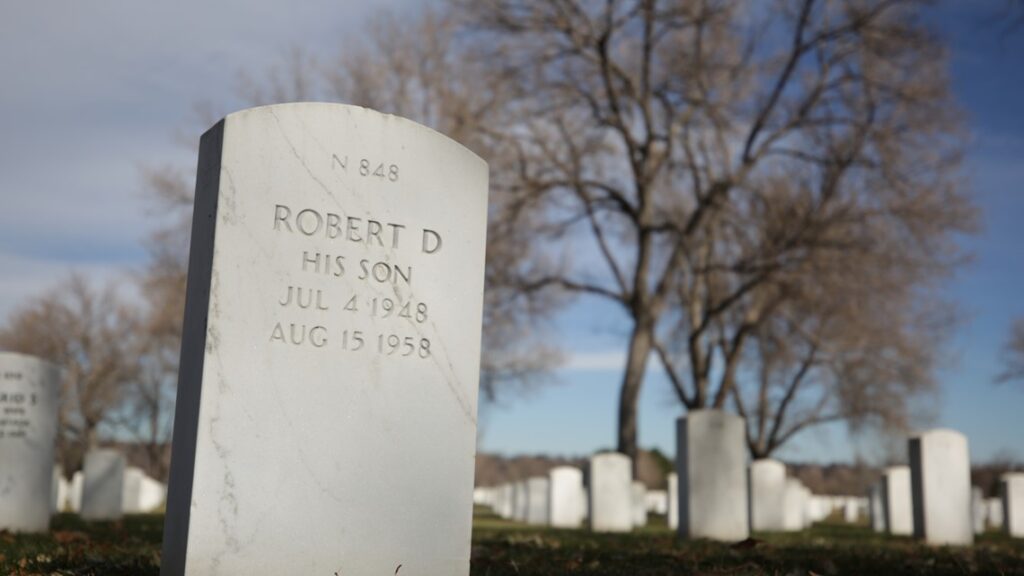 Credit: Anna Hewson, KUSA Bobby Bizup's tombstone at Fort Logan National Cemetery.