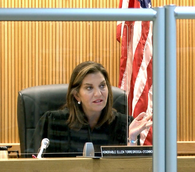 State Superior Court Judge Ellen Torregrossa-O'Connor presides over the trial of the Rev. Henry "Brendan" Williams at the Monmouth County Courthouse in Freehold Tuesday, May 25, 2021. Williams, the former pastor of St. Veronica R.C. Church in Howell, is accused of sexally assaulting a pre-teen girl in the late 1990s. -- Thomas P. Costello