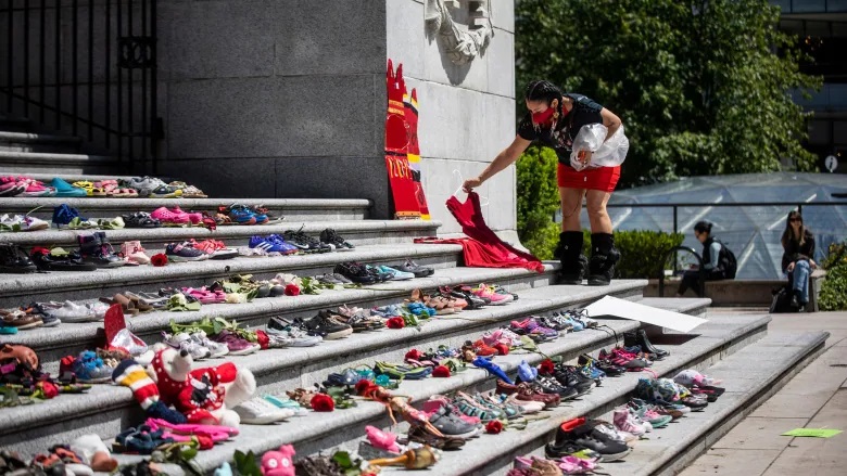 Indigenous Peoples from the Pacific Association of First Nation Women hold a ceremony in Vancouver after reports that the buried remains of 215 children have been discovered at the former Kamloops Indian Residential School on Tk'emlúps te Secwépemc First Nation grounds on Friday. (Ben Nelms/CBC)