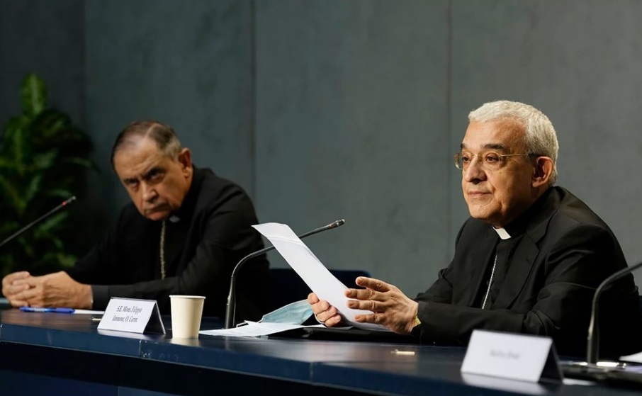 Archbishop Filippo Iannone, right, and Bishop Juan Ignacio Arrieta hold a press conference to illustrate changes in the Church’s Canon law, at the Vatican, Tuesday, June 1, 2021. Pope Francis has changed church law to explicitly criminalize the sexual abuse of adults by priests who abuse their authority and to say that laypeople who hold church office can be sanctioned for similar sex crimes. (AP Photo / Andrew Medichini)