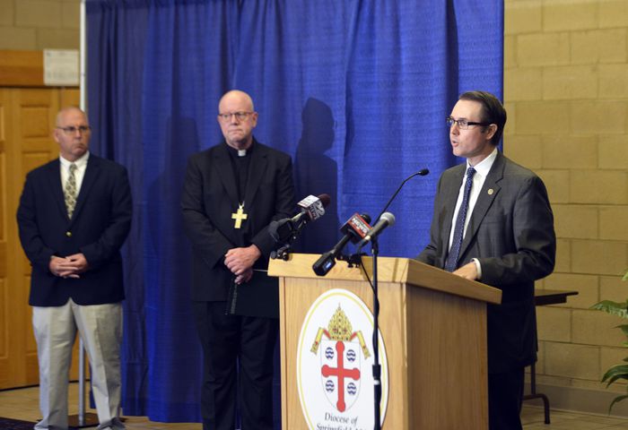 Jeffrey Trant, director of the Office of Safe Environment and Victim Assistance at the Springfield Diocese, speaks at a press conference at the Bishop Marshall Center in Springfield to discuss the addition of 40 names to the list of accused sexual abusers in the clergy. On the far left is abuse survivor Doug Cole and next him is The Most Rev. William D. Byrne, bishop of the Roman Catholic Diocese of Springfield. (Don Treeger / The Republican)