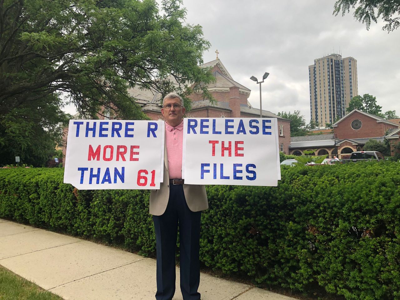 Robert M. Hoatson, founder of the clergy abuse victims advocacy group Road to Recovery, protests outside St. Michael's Cathedral in Springfield on June 3, 2021. (Stephanie Barry photo)