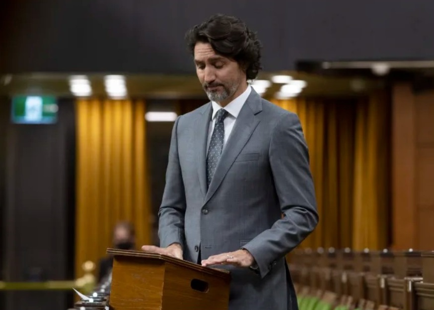 Canadian Prime Minister Justin Trudeau speaks during a debate about the discovery of remains of 215 children at the site of the Kamloops Indian Residential School, in the House of Commons, in Ottawa, Ontario, Tuesday, June 1, 2021. (Adrian Wyld / The Canadian Press via AP)