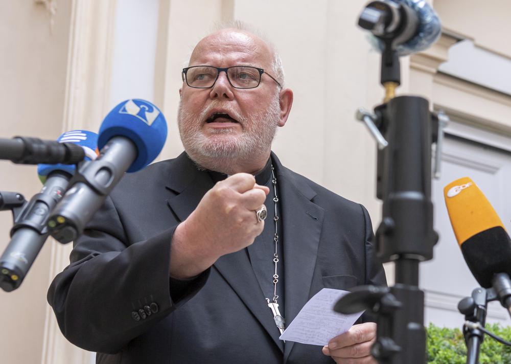 FILE - In this Germany, Friday, June 4, 2021 file photo, Cardinal Reinhard Marx, Archbishop of Munich and Freising, gives a statement to the press in the courtyard of his residence in Munich. Pope Francis refused Thursday, June 10, 2021 to accept the resignation offered by German Cardinal Reinhard Marx over the sex abuse scandal in the church, but said a process of reform was necessary and that every bishop must take responsibility for the “catastrophe” of the crisis. (Peter Kneffel/dpa via AP, File)