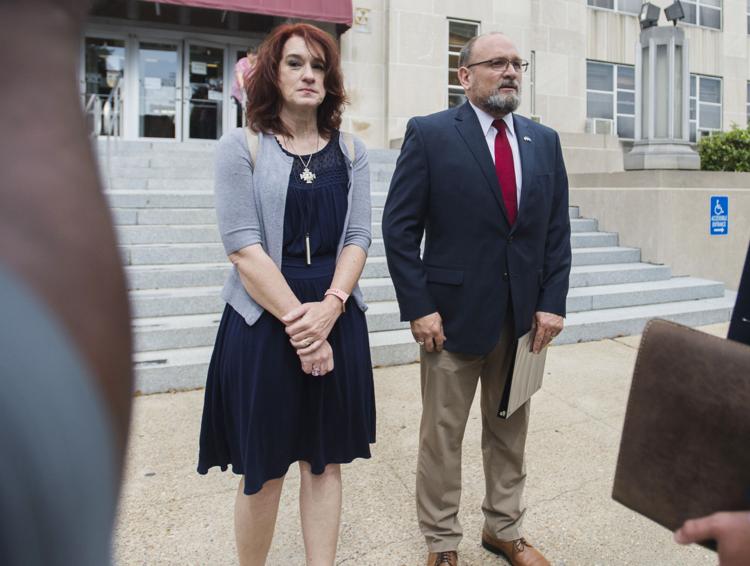 Scott and Letitia Peyton prepare to speak to media following a sentencing hearing for former priest Michael Guidry Tuesday, April 30, 2019, at the St. Landry Parish Courthouse in Opelousas, La.  Advocate staff photo by Leslie Westbrook