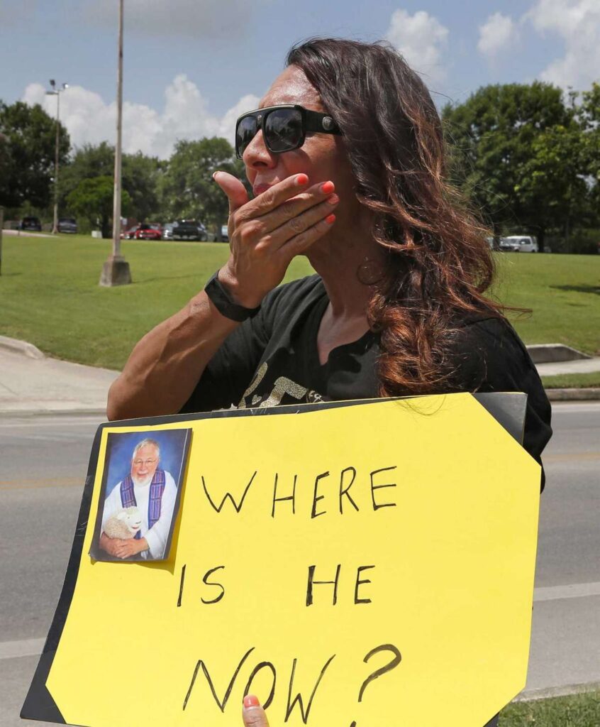 Gianna Recio, who said she was a victim at 11 years old, joins others as the Survivors Network of those Abused by Priests call for action by Archbishop of San Antonio Gustavo García-Siller and St. Mary’s University President Thomas Mengler during a news conference outside the Archdiocese of San Antonio on Wednesday.  Ronald Cortes /Contributor