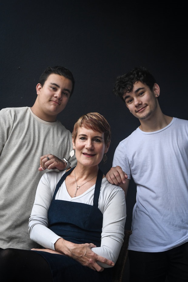 Xanana Gusmao’s ex-wife, Kirsty Sword Gusmao, with two of their sons Daniel, left, and Alexandre, who have sent letters of support to Daschbach’s accusers.CREDIT:JUSTIN MCMANUS