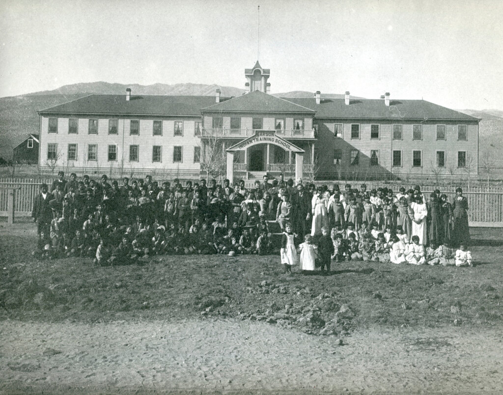 An undated photo of the Carson Indian Training School in Nevada and students. Founded in 1890, the 240-acre boarding school operated for nine decades as part of a federal effort to erase Indigenous culture.Credit...Stewart Indian School Cultural Center and Museum, via Associated Press