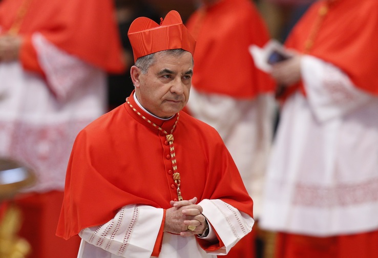 Italian Cardinal Angelo Becciu is pictured at the Vatican in this 2018 photo. Cardinal Becciu, forced to resign in September amid a financial scandal, said Pope Francis celebrated Holy Thursday Mass of the Lord's Supper with him in his private chapel April 1, 2021. (CNS photo/Paul Haring)  