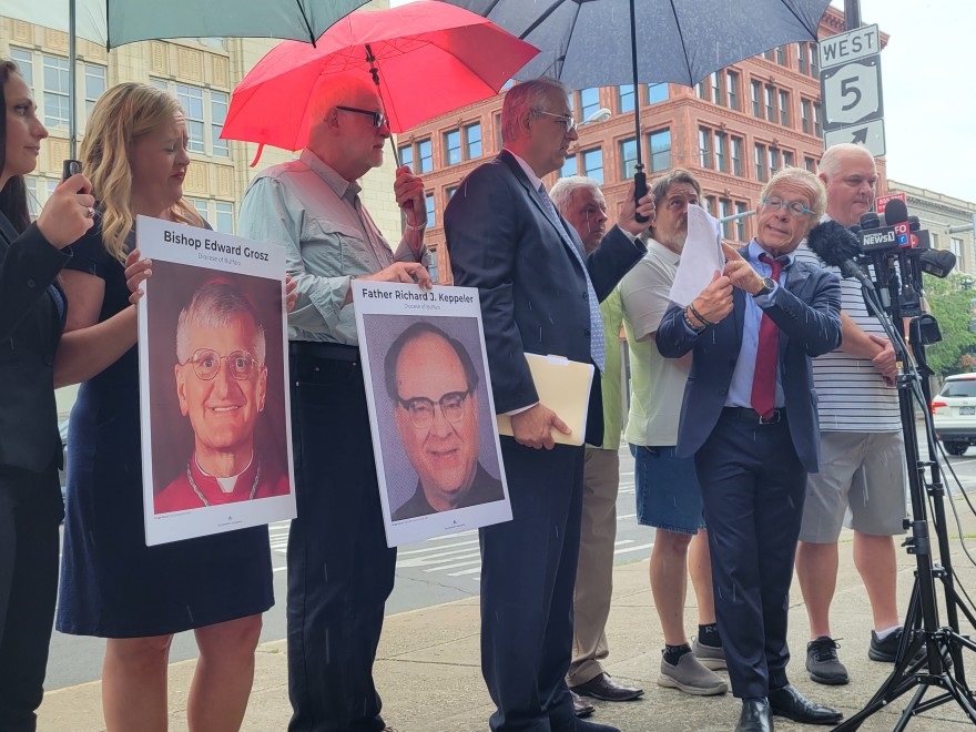 ttorneys and abuse survivors stand across the street from the Catholic Diocese of Buffalo July 13, 2021 to discuss a Child Victims Act lawsuit that alleges retired Auxiliary Bishop Edward Grosz and the late Rev. Richard Keppeler of abusing a 15-year-old boy three decades ago.