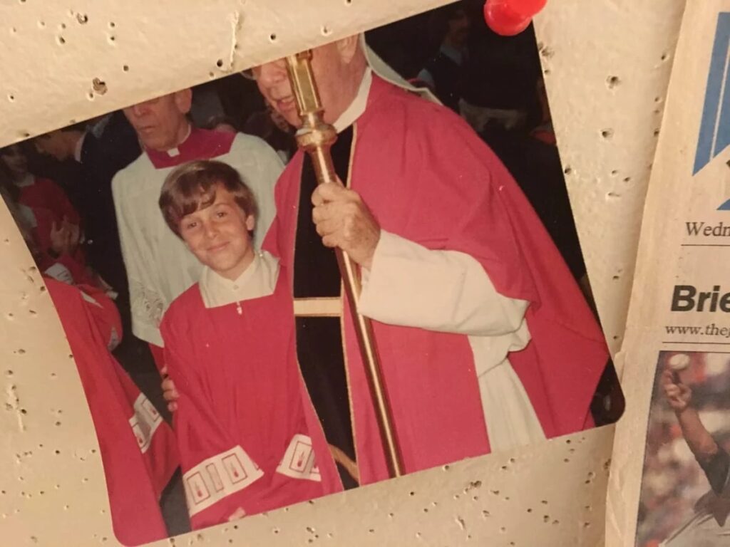 The photo of Peter in his altar boy vestments pinned to the author’s research bulletin board.  Courtesy Jenny Grosvenor