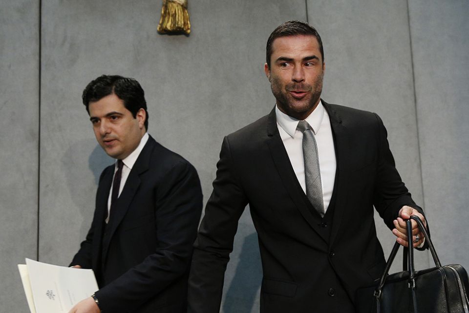 Tommaso Di Ruzza, left, then director of the Financial Intelligence Authority, and René Brülhart, then president of the same Vatican office, arrive for a news conference at the Vatican April 28, 2016. (CNS / Paul Haring)