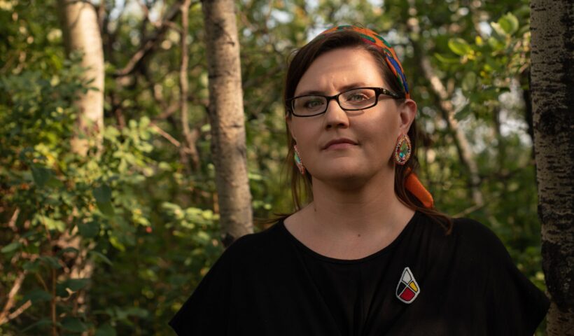 Professor Supernant’s beaded pin was created by a Métis artist. Amber Bracken for The New York Times